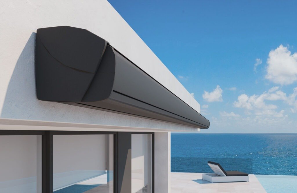 Toldo de brazos invisibles con cofre automatizado